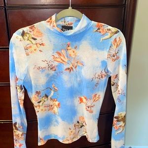 Blue Sheer Angel Mockneck Top
